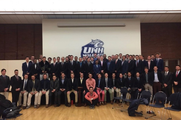 All of the members of TKE lined up in the Strafford Room at UNH