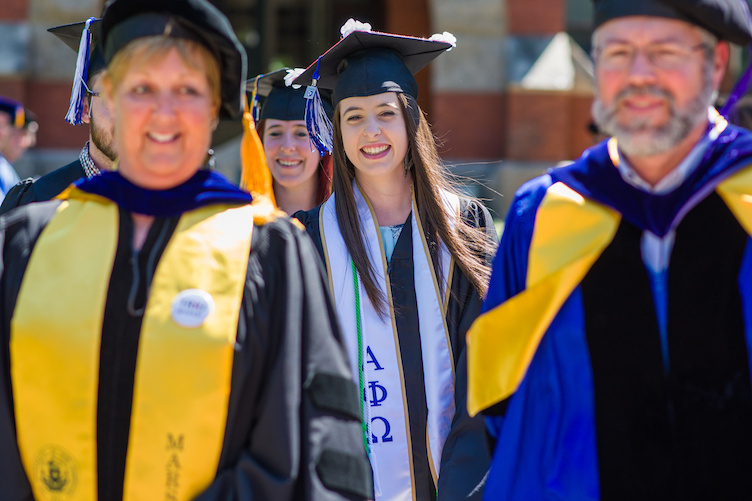 UNH graduate Jessica Nadeau '18 and UNH faculty members during ceremony