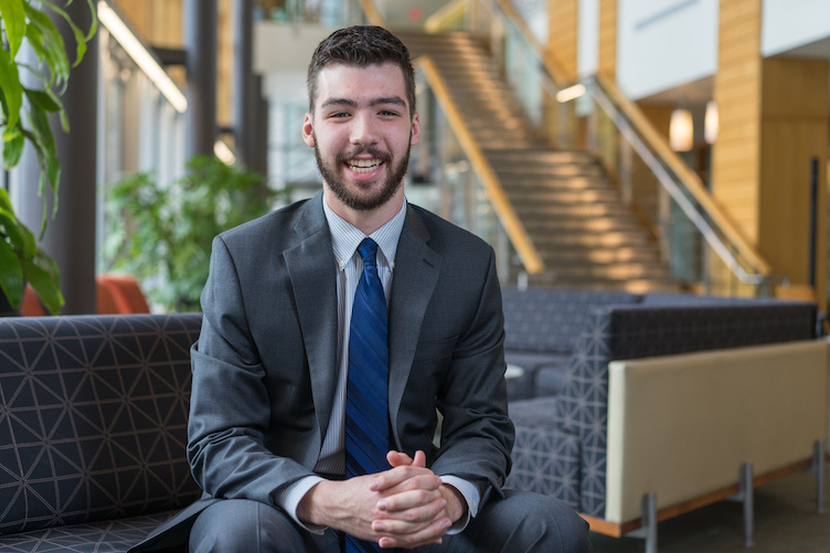 Lawson Martinez ’18 in the lobby of the Paul College.