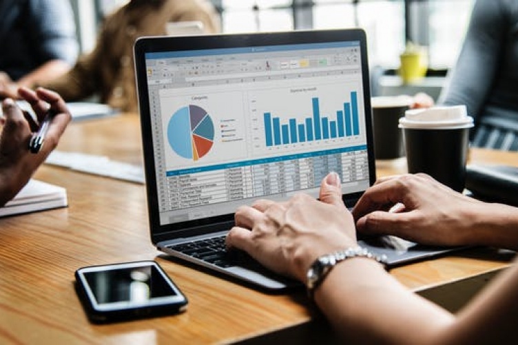 image of person making a graph, pexels.com image