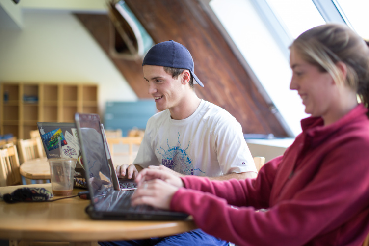 Students studying with laptops