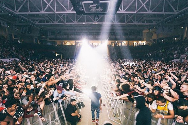 Stadium of students watching A$AP Ferg