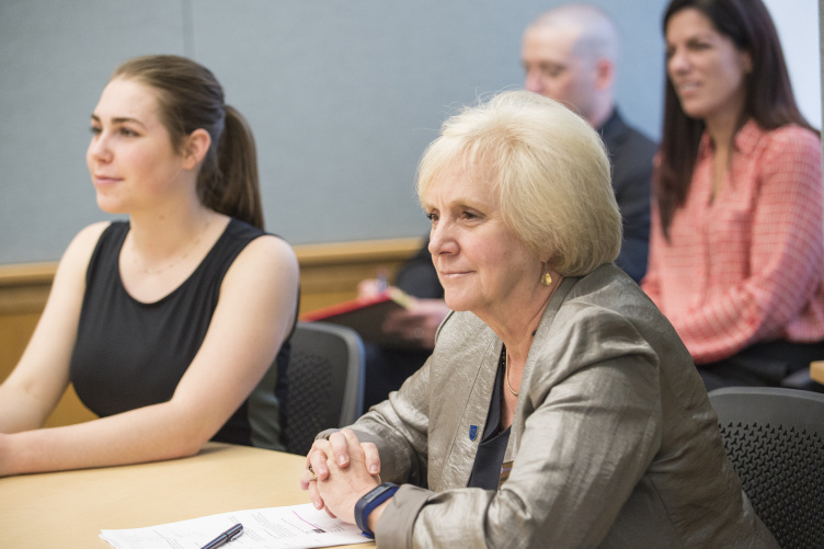 UNH Paul College Dean Merrill-Sands with students