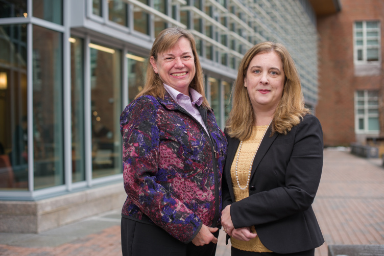 Associate Professor of Accounting Catherine Plante and Assistant Professor of Accounting Linda Ragland pose outside of Paul College