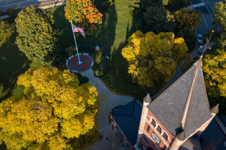 Thompson Hall and fall trees seen from above