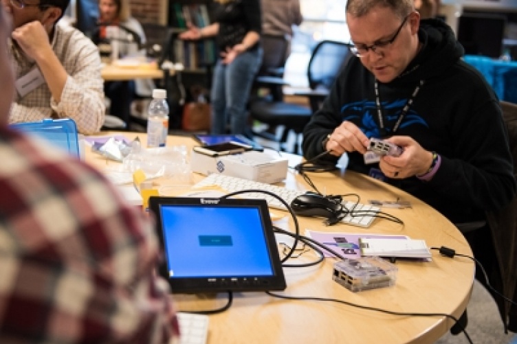 Educators explore computer science activities to bring back to their classrooms at CS4NH Launch Day.