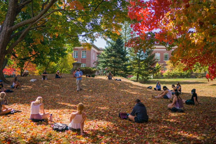 Associate professor Brent Bell teaching class outside