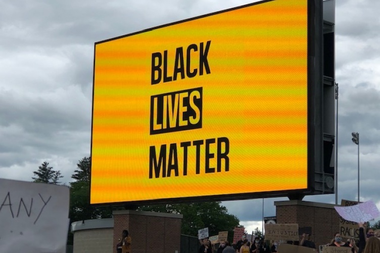 sign that reads: Black Lives Matter