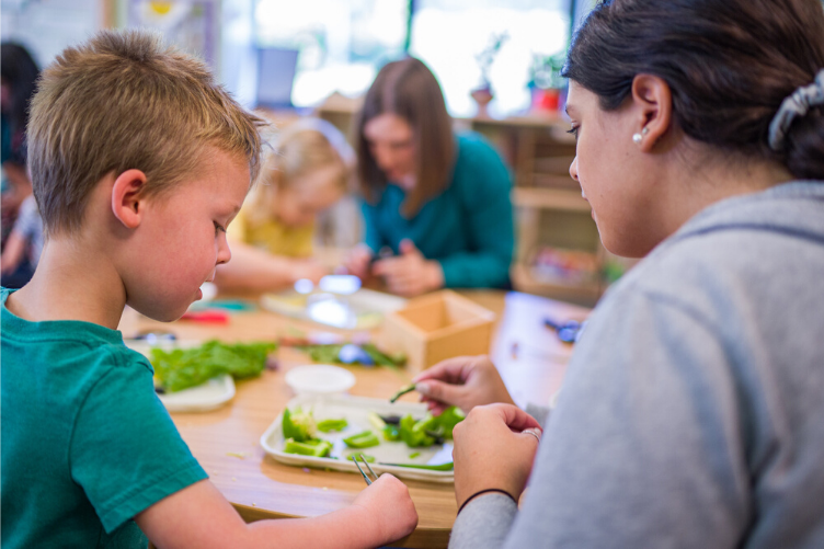 Teachers work with students at the Child Study and Development Center at UNH