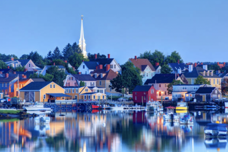 Image of the Portsmouth waterfront at dusk.