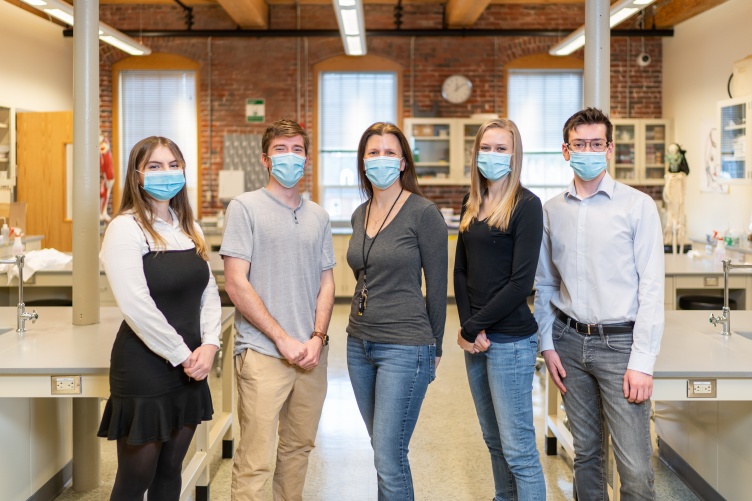 Professor Sue Cooke and four UNH Manchester students who make up Team Cooke