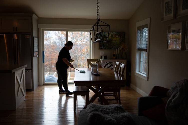 Image of women cleaning table