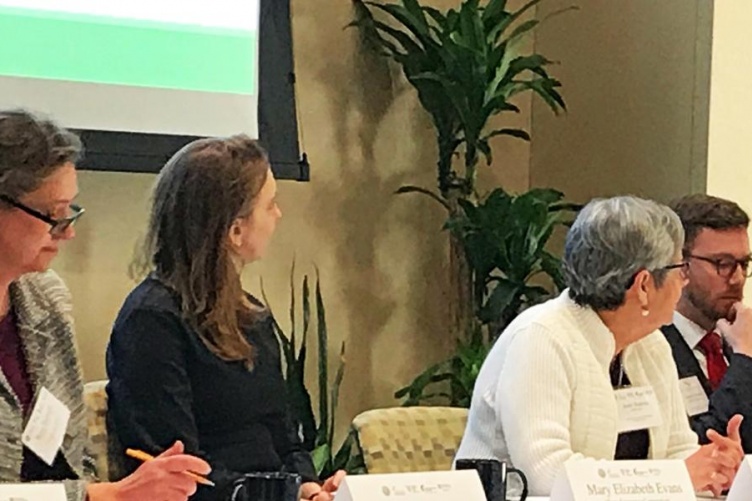 Image of Financial Innovations Roundtable meeting with attendees 