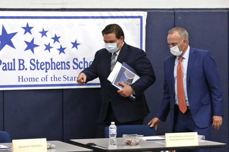 Florida Governor Ron DeSantis and Florida Education Commissioner Richard Corcoran at a roundtable event