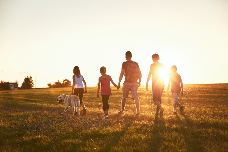 image of family walking