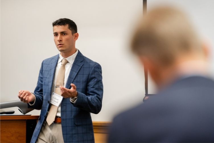 Jackson ‘O Connell ’24 gives his stock pitch during the 2022 Finance Symposium.