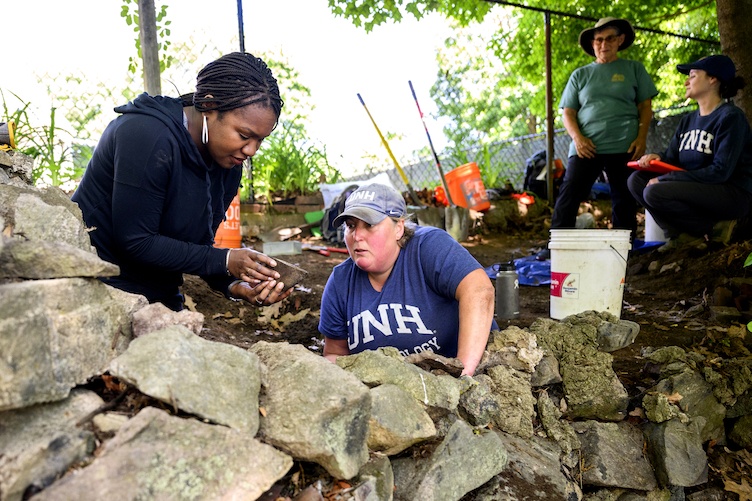 Kabria Baumgartner and Meghan Howey at a dig site