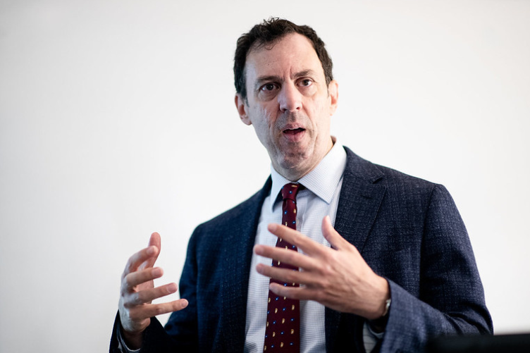 UNH Associate Professor Stephen Ciccone leads a lecture at the front of the classroom. UNH Associate Professor Stephen Ciccone leads a lecture at the front of the classroom.