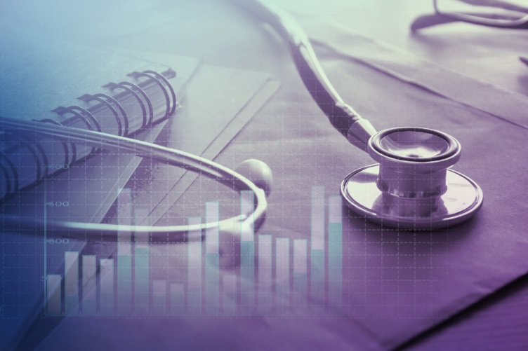 a photo of a doctors stethoscope and paperwork to illustrate healthcare management