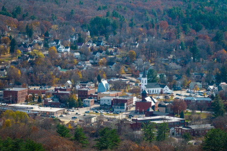 Drone shot of small NH town in early autumn