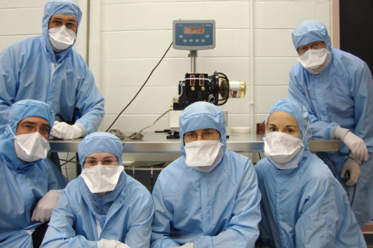 students in medical gowns and masks students in medical gowns and masks