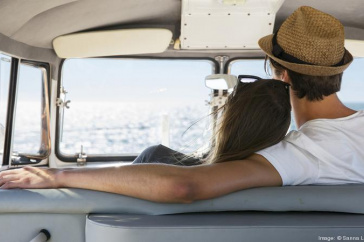 Image of man and woman in the car.
