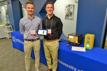 UNH students presenting their research on vehicle technology