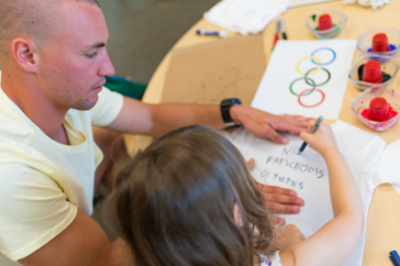 CHHS student with child at Child Study Development Center