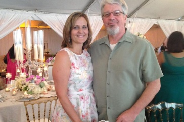 Photo of Wendy and David Jones standing together at a party.