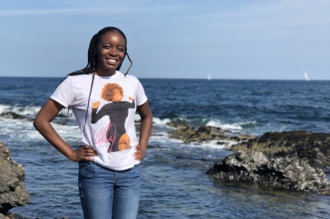Simone Chapman stands at the beach