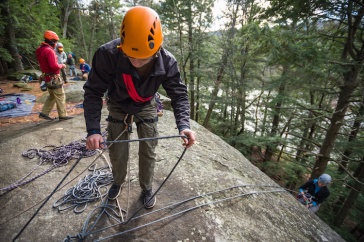 Students rock climbing for therapy