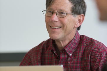 David Finkelhor works at a laptop