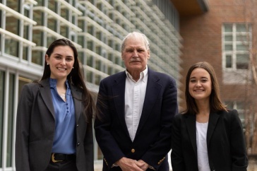 UNH Paul College students Aidan Kittredge and Kelsie Dawe with Professor Jeffrey Sohl