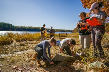 Meghan Howey works with student archaeology students on a dig near Great Bay.