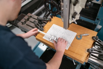 Mechanical engineering technology students works in UNH Manchester machine shop