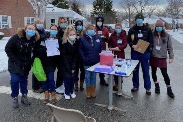 group of students outside clinic where COVID vaccines were given