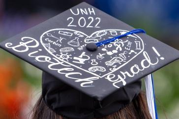 graduation hat at UNH Manchester commencement