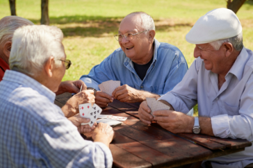 Older men play cards