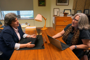 Administrators from COLSA and CCSNH discuss a new articulation agreement.