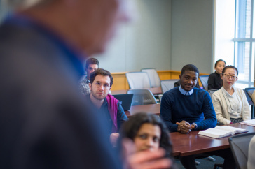 Students listening to a professor