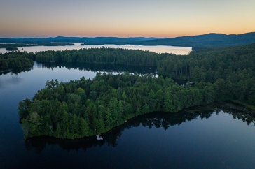 Aerial view of a lake at sunset