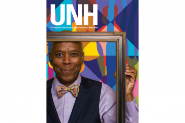 UNH Magazine Winter 2019 Cover - Richard Haynes holding a picture frame