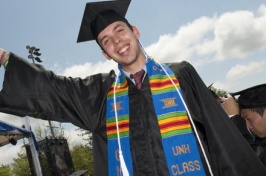 student in multicultural attire at commencement