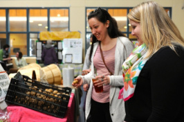 students at local farmers market