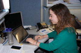 Melissa Proul working on a story