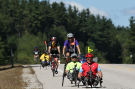 cyclists riding three notch century