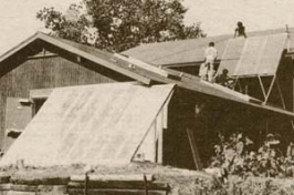 solar panels being install on woodruff house in the minidorms, 1980's