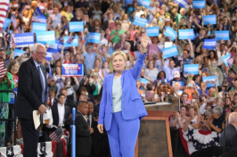Hillary Clinton greets the crowd along with Senator Bernie Sanders during an event in which she was endorsed by Senator Sanders at Portsmouth High School on Tuesday, July 12, 2016 in Portsmouth, New Hampshire. (Bryce Vickmark/Zuma Press/TNS)