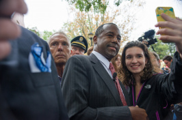 Elizabeth Girard '16 with presidential candidate Ben Carson at UNH