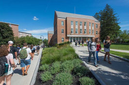 UNH students walking outside of Paul College